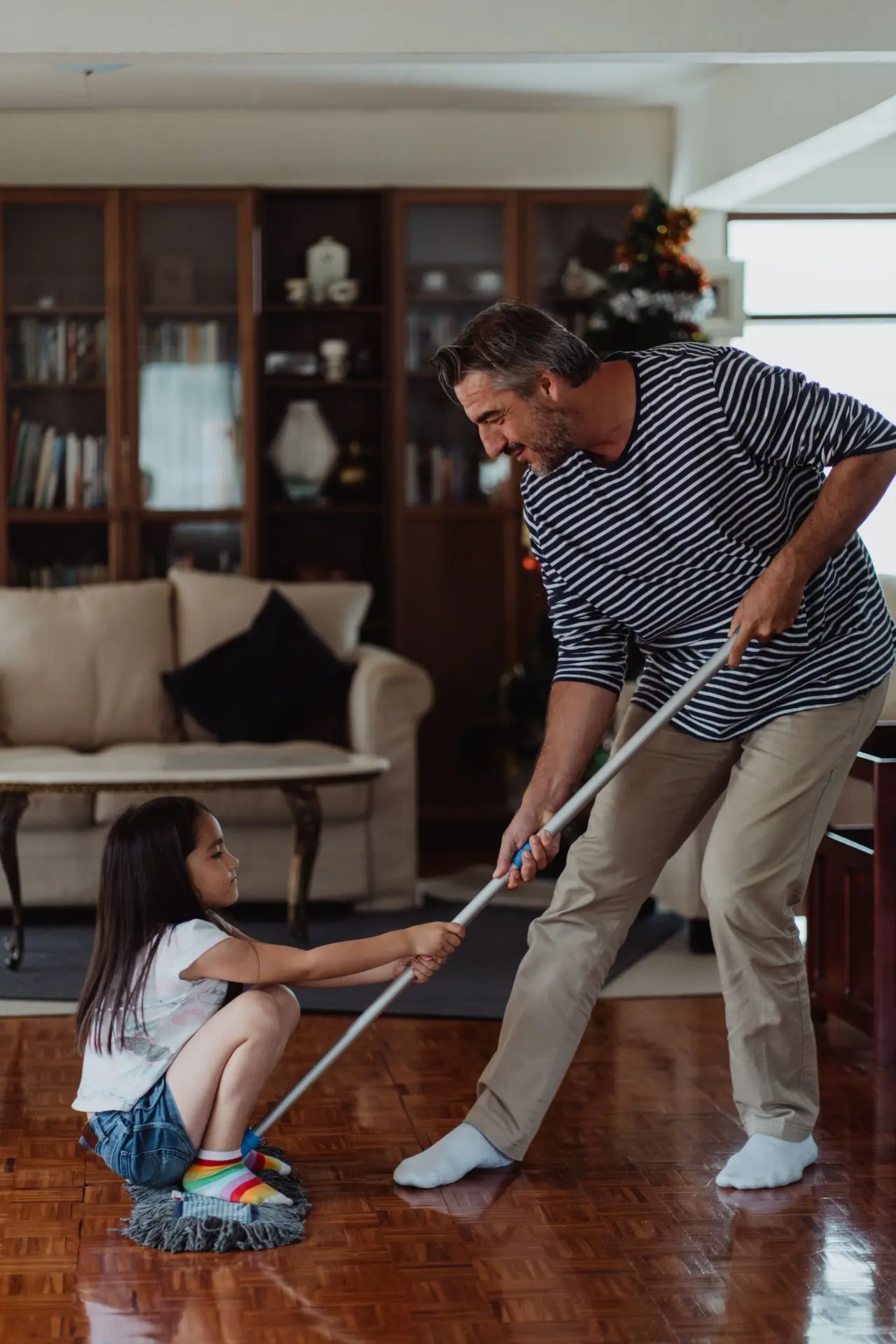A family enjoying freshly cleaned carpet in their Seattle, WA living room